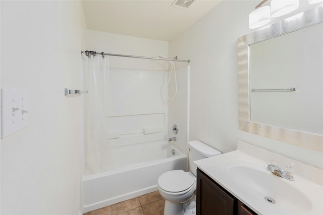 bathroom featuring vanity, visible vents, tile patterned flooring, shower / bath combination with curtain, and toilet