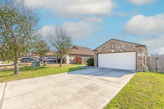 single story home with a garage, brick siding, a front yard, and fence