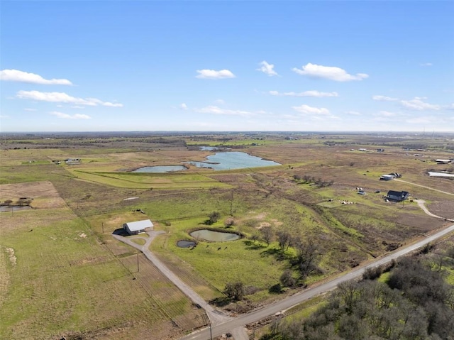 700 County Road 466, Elgin, TX 78621 - aerial overview of property's location with a large body of water and rural landscape