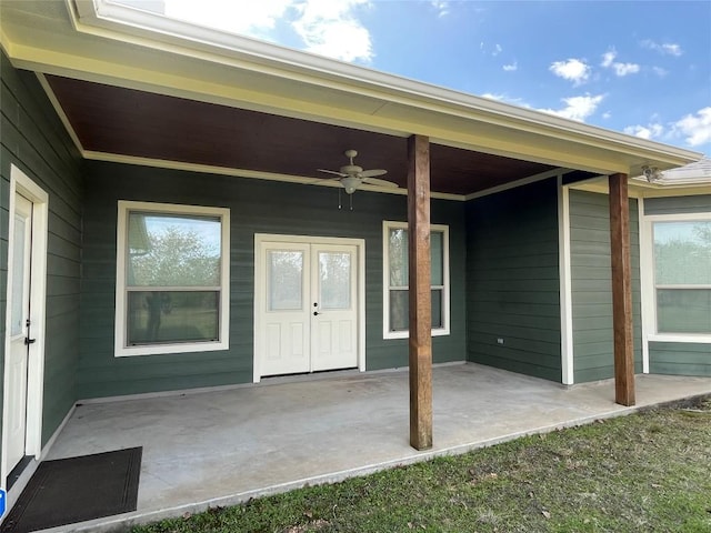 doorway to property featuring a patio area and ceiling fan