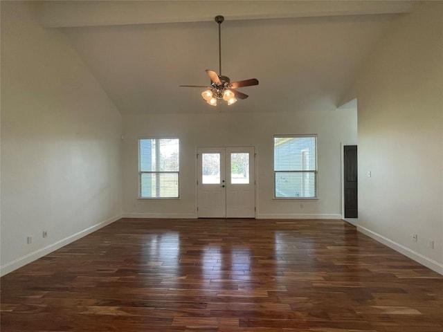 unfurnished living room with high vaulted ceiling, wood finished floors, french doors, baseboards, and ceiling fan