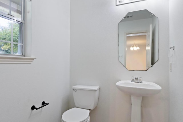 bathroom featuring toilet