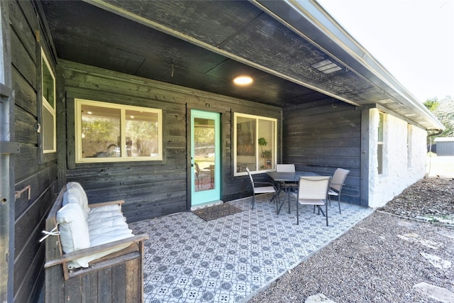 view of patio with outdoor dining space