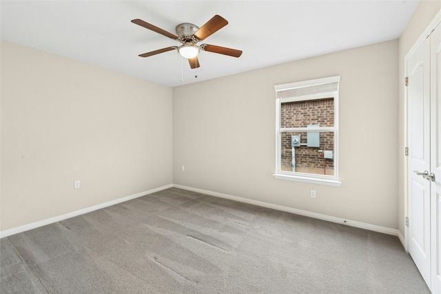 unfurnished bedroom with ceiling fan, baseboards, and carpet floors