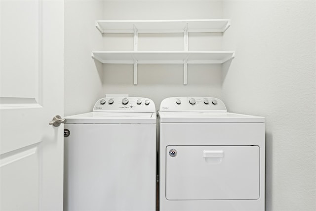 laundry room featuring laundry area and washing machine and dryer