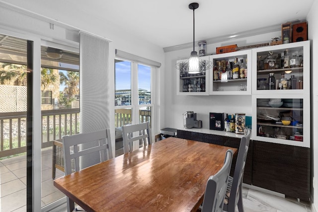 dining room with marble finish floor