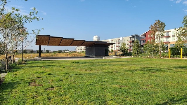 view of home's community featuring a lawn