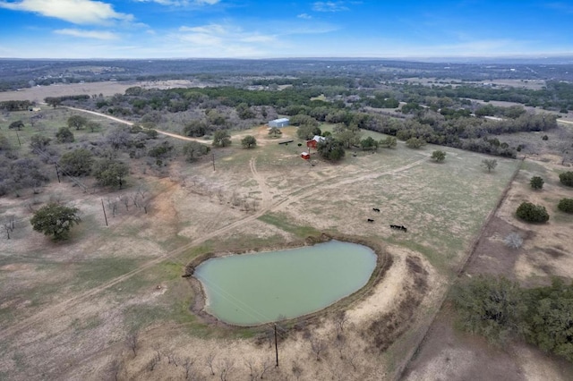 aerial view featuring a rural view and a water view