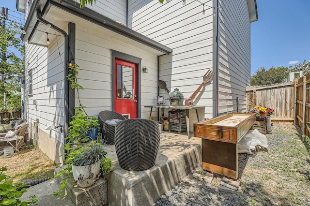 exterior space featuring a patio and fence