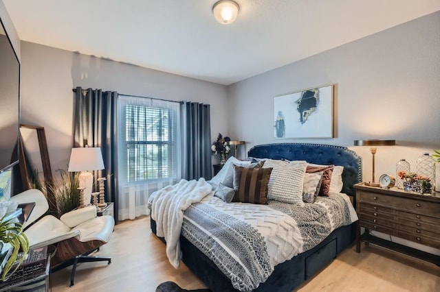 bedroom with light wood-style flooring