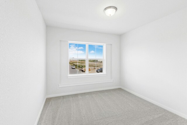 4419 College Square Dr, Round Rock, TX 78665 - carpeted spare room featuring baseboards