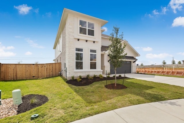 4419 College Square Dr, Round Rock, TX 78665 - view of front of property featuring fence, driveway, stone siding, and stucco siding