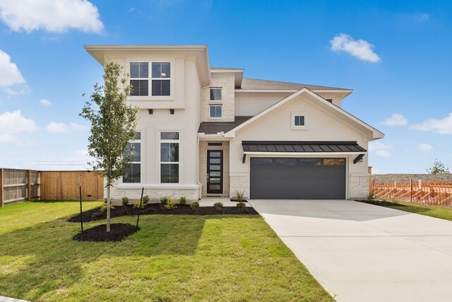 4419 College Square Dr, Round Rock, TX 78665 - view of front of property with a front lawn, fence, driveway, and stone siding