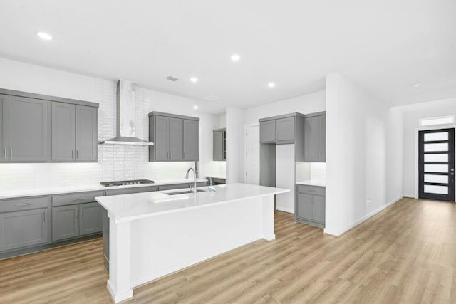 4419 College Square Dr, Round Rock, TX 78665 - kitchen featuring gray cabinets and wall chimney range hood