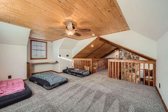 bedroom with vaulted ceiling, carpet, baseboards, and wooden ceiling