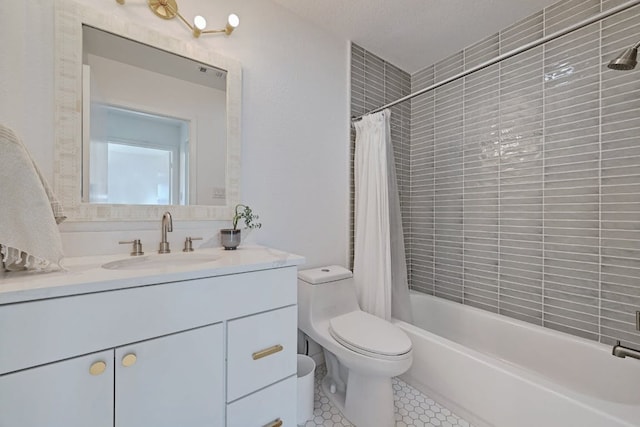 bathroom featuring shower / bath combo with shower curtain, toilet, vanity, and tile patterned flooring