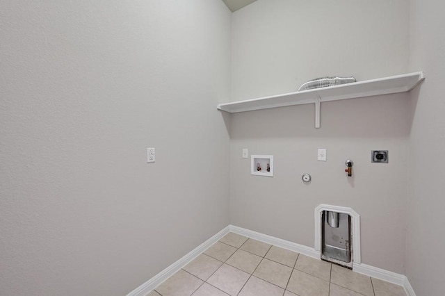 washroom with light tile patterned floors, laundry area, hookup for a washing machine, hookup for a gas dryer, and hookup for an electric dryer