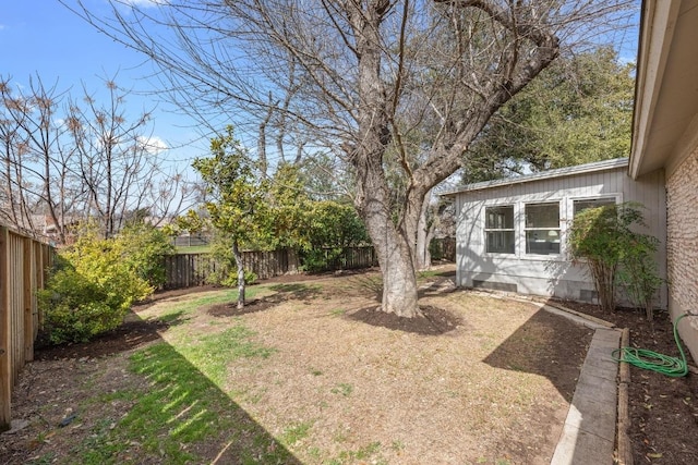 view of yard featuring a fenced backyard