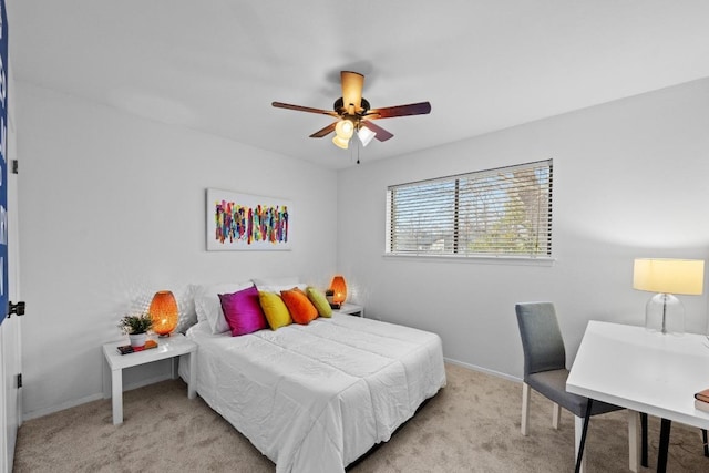 bedroom featuring baseboards, carpet, and a ceiling fan