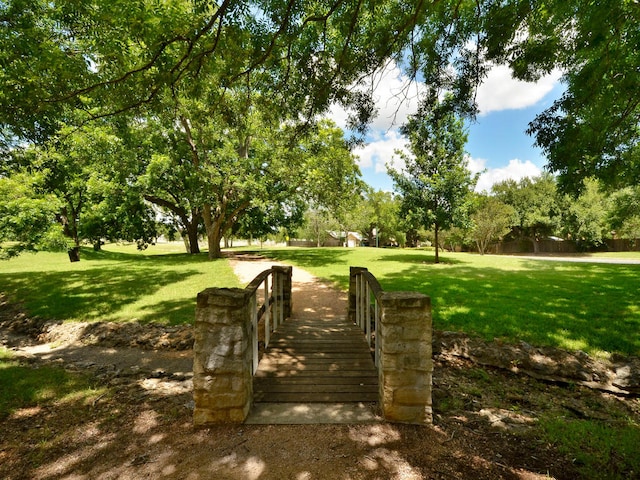 view of home's community featuring a yard