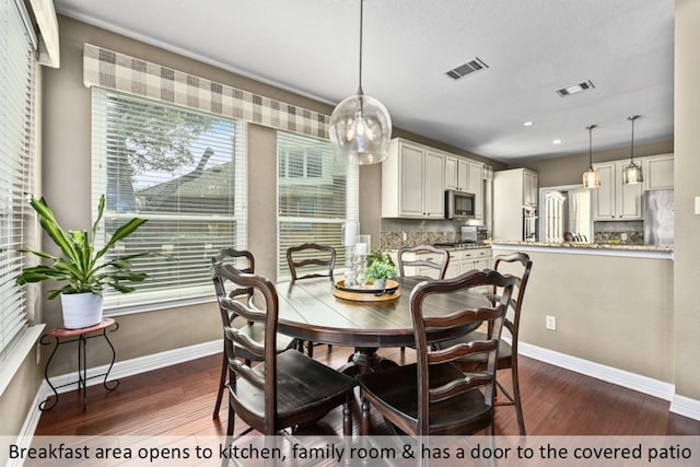 dining space with recessed lighting, visible vents, baseboards, and dark wood-style floors