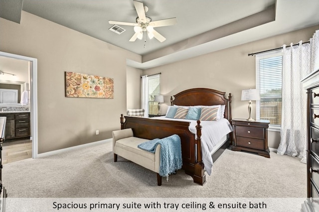 carpeted bedroom featuring multiple windows, baseboards, and visible vents