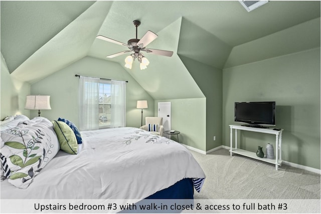 carpeted bedroom with baseboards, lofted ceiling, and a ceiling fan