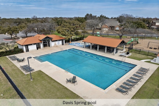 view of swimming pool with a gazebo, a yard, a patio area, and fence