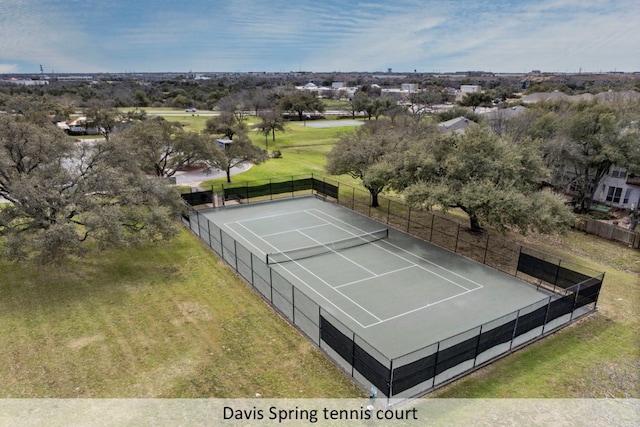 view of sport court with fence