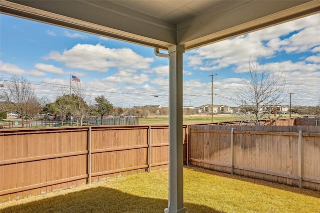 view of yard featuring a fenced backyard