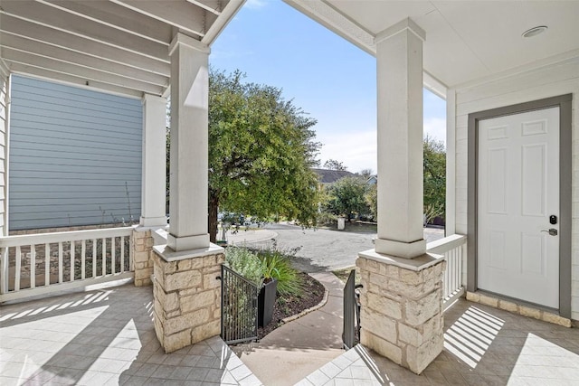 view of patio featuring covered porch