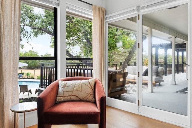 sunroom / solarium with a wealth of natural light