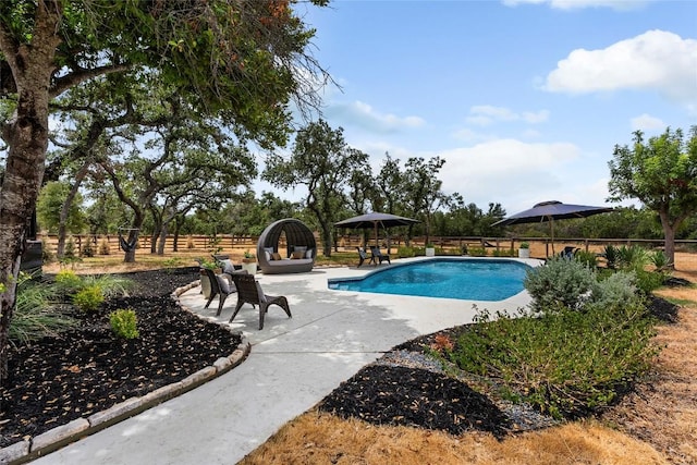 view of pool featuring a fenced in pool, a patio, and fence