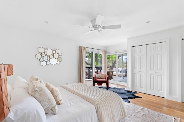 bedroom with access to exterior, wood finished floors, ceiling fan, and recessed lighting