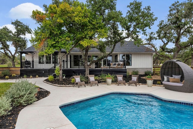 swimming pool with a patio