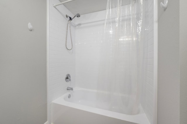 full bathroom with shower / bath combination with curtain