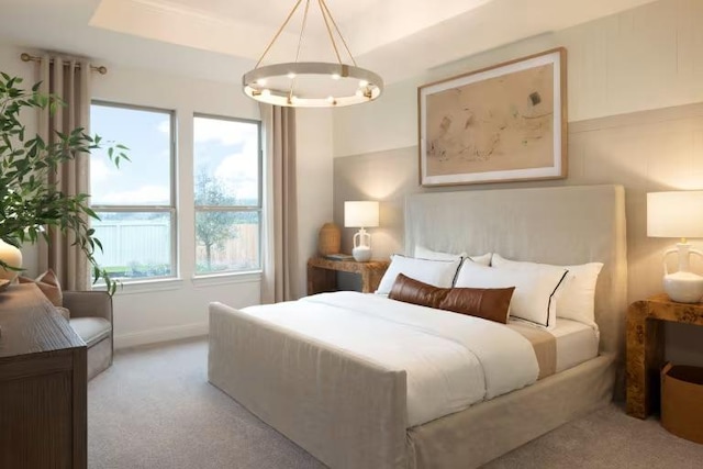 bedroom with a notable chandelier and light colored carpet