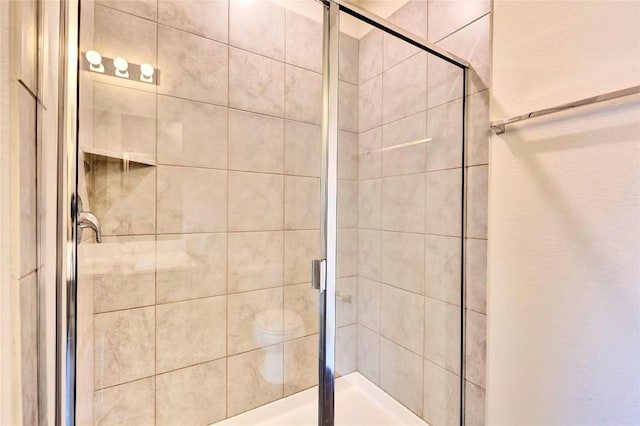 full bathroom featuring a stall shower