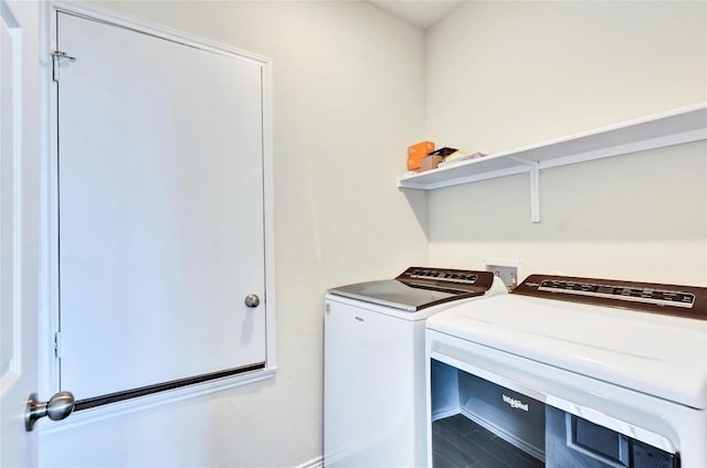 laundry room featuring laundry area and separate washer and dryer