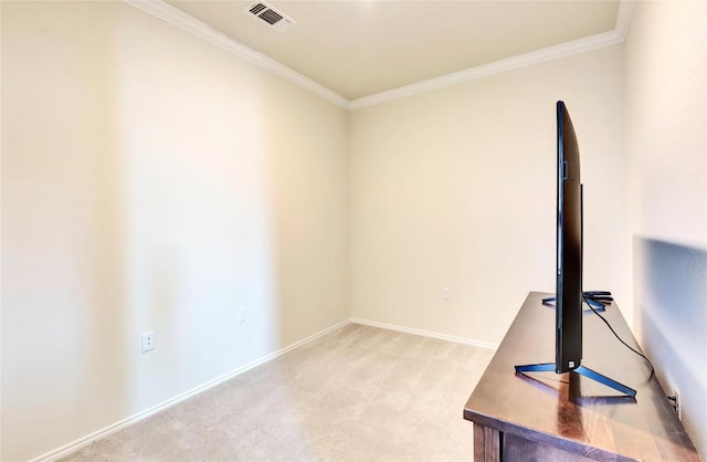 interior space with crown molding, light colored carpet, visible vents, and baseboards