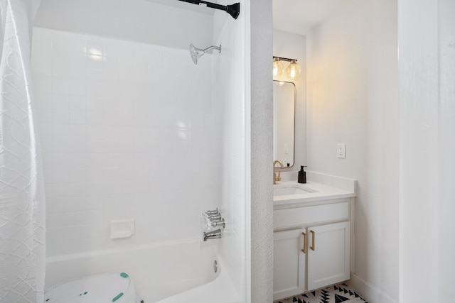 full bath featuring vanity and shower / bath combo