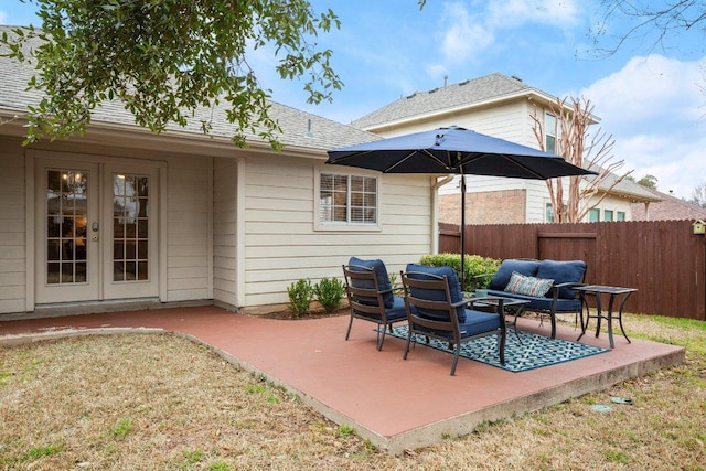 view of patio / terrace with fence and french doors