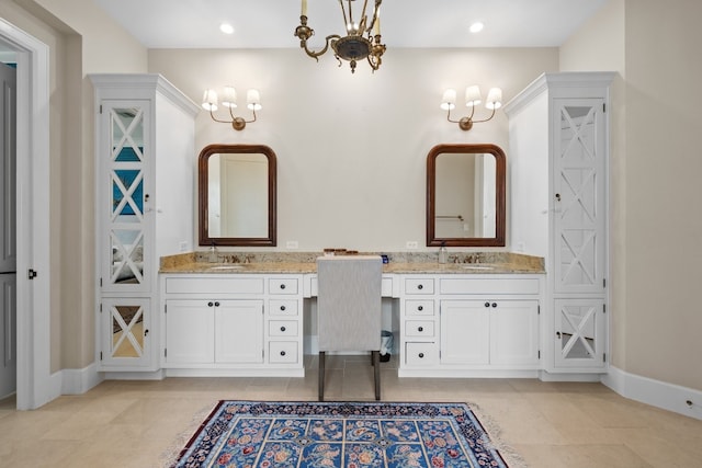 bathroom featuring recessed lighting, vanity, and baseboards