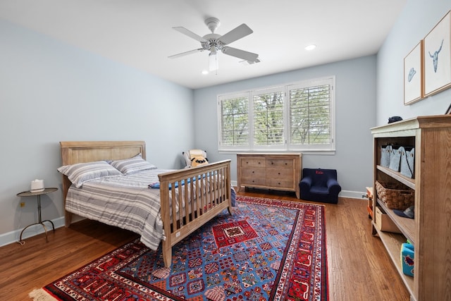 bedroom featuring visible vents, baseboards, recessed lighting, wood finished floors, and a ceiling fan