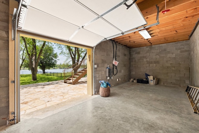 garage featuring a water view