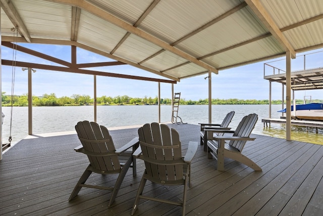 view of dock with boat lift and a water view