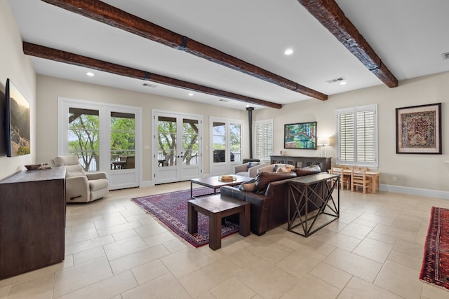 living area featuring recessed lighting, visible vents, plenty of natural light, and french doors