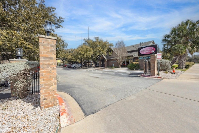 view of road featuring curbs