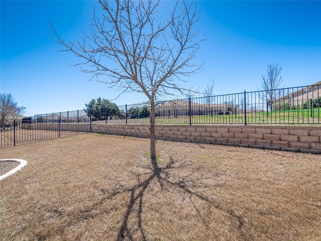 view of yard with fence