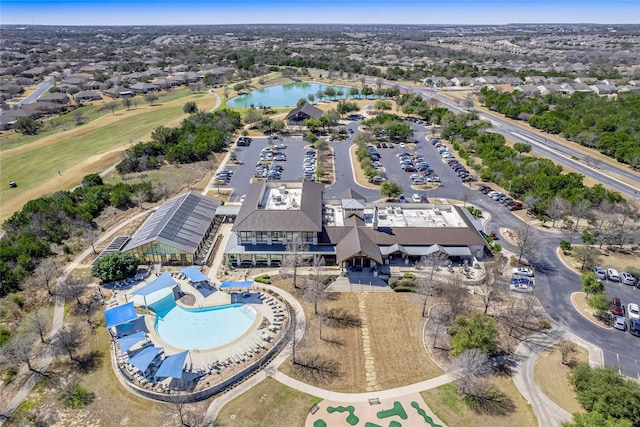 aerial view featuring a residential view and a water view